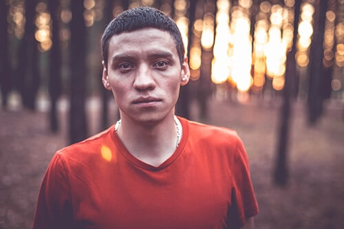 dangers of synthetic drugs A solemn man thinks about the dangers of synthetic drugs